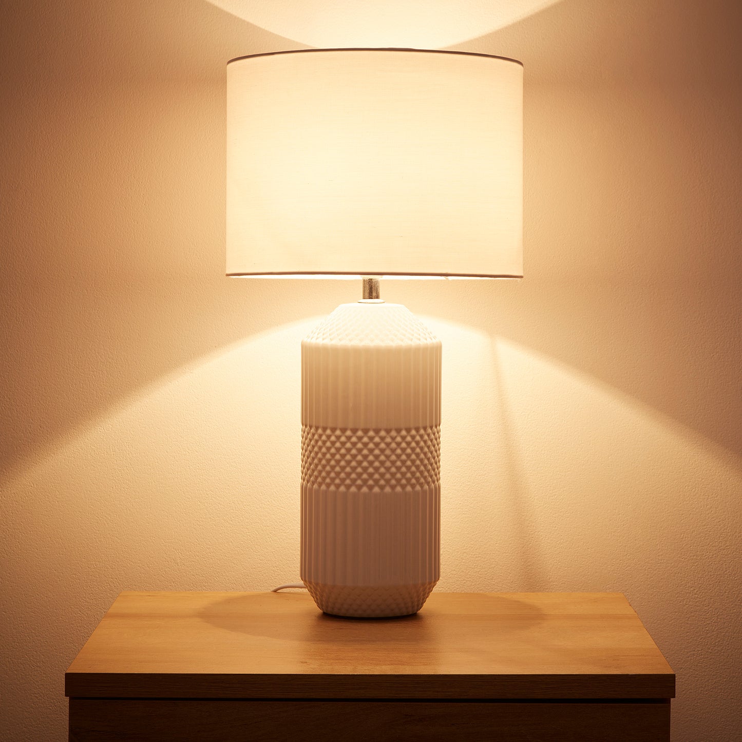 White Ceramic Table Lamp with a Gloss White body and White Cotton Lampshade