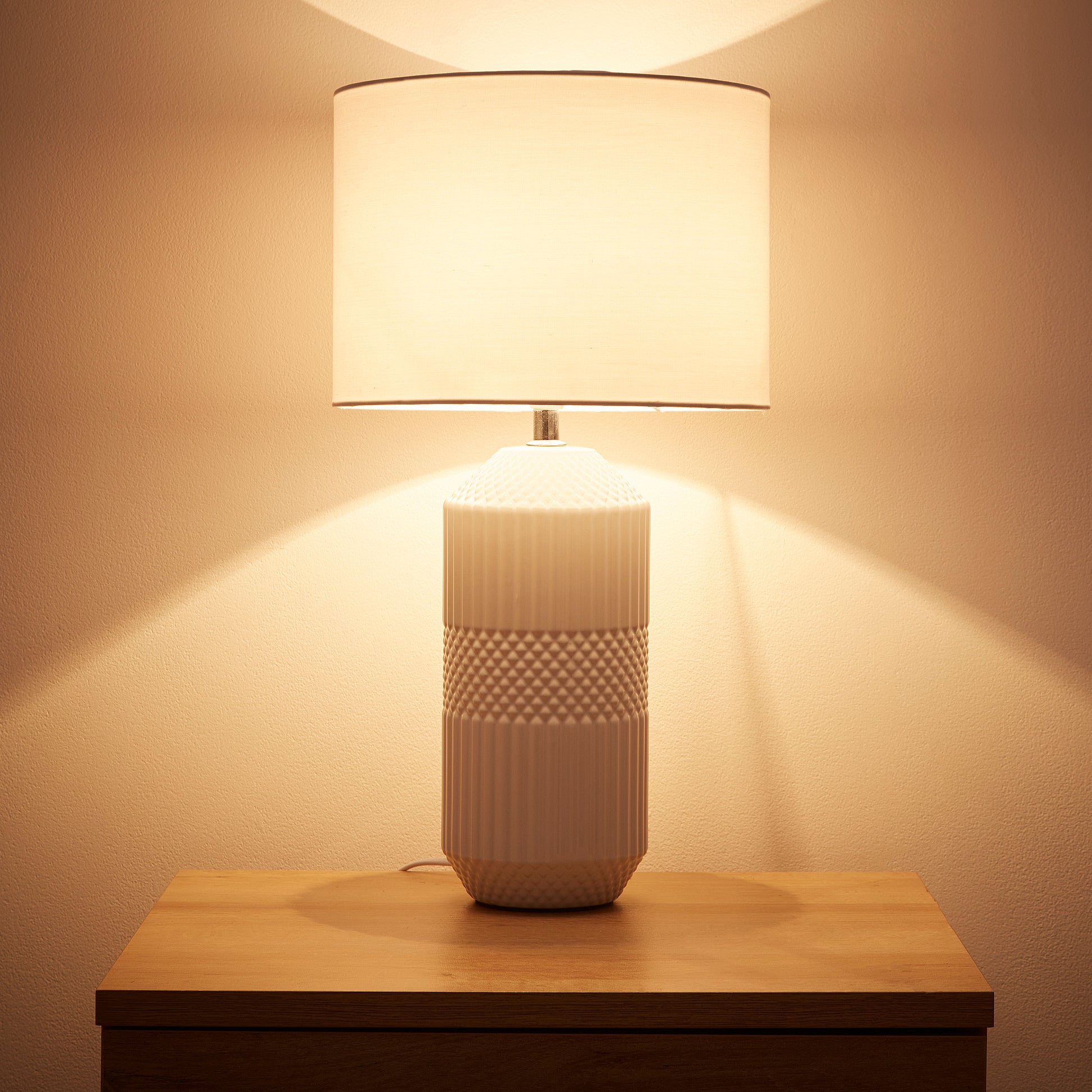 White Ceramic Table Lamp with a Gloss White body and White Cotton Lampshade