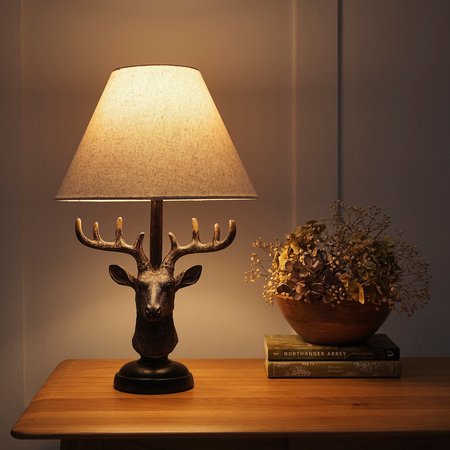 Antlers Stag Head Animal Table Lamp in an Antique Copper Table Lamp with a Natural Linen Lampshade