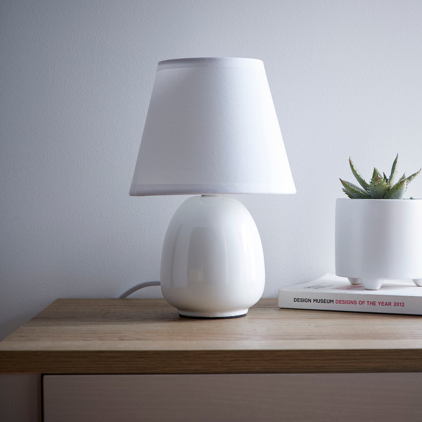 Small Ceramic Bedside or Table lamp with White Lampshade available in 3 Colours