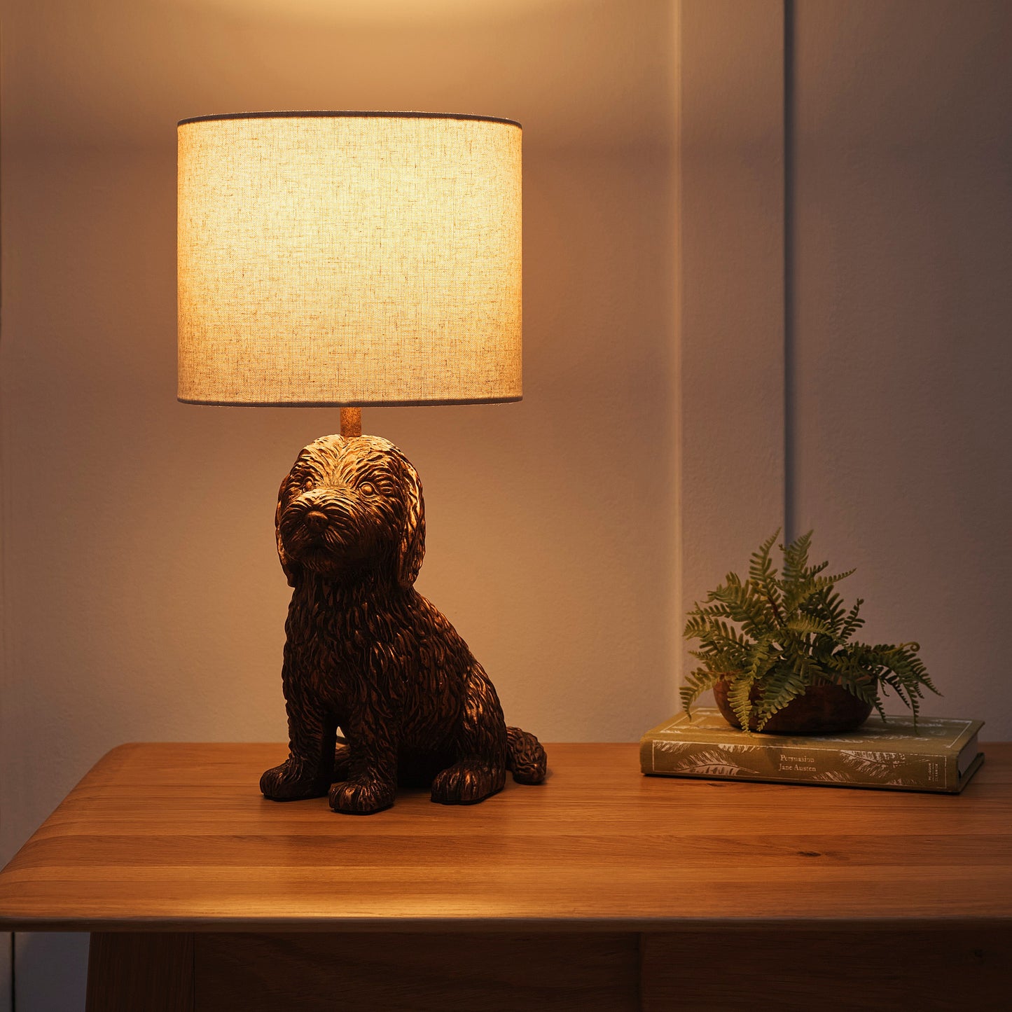 Puppy Animal Table Lamp in an Antique Copper Finish with a Natural Linen Shade
