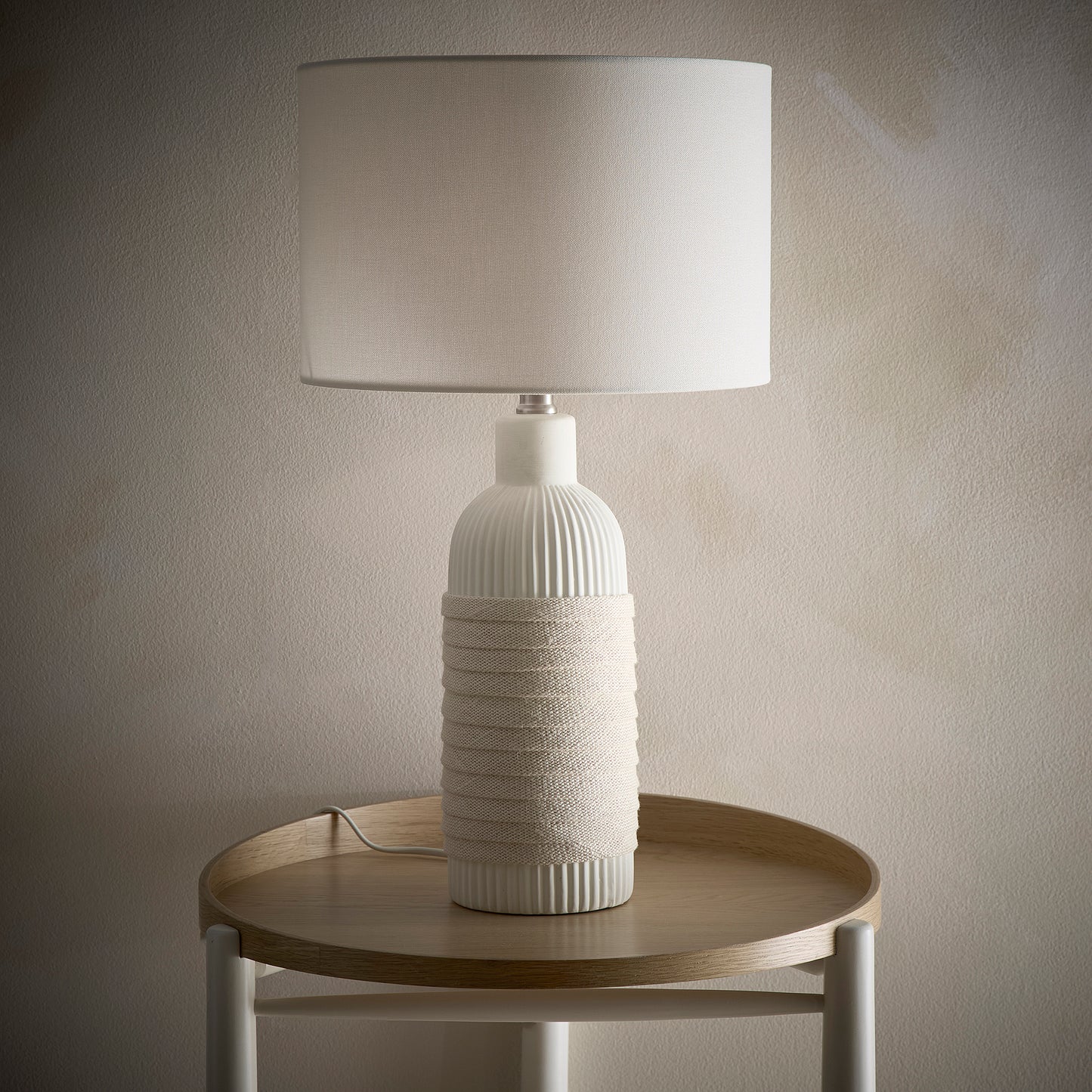 Ceramic Table Lamp in a Light Cream Finish with a Natural Rope design and a Linen Lampshade
