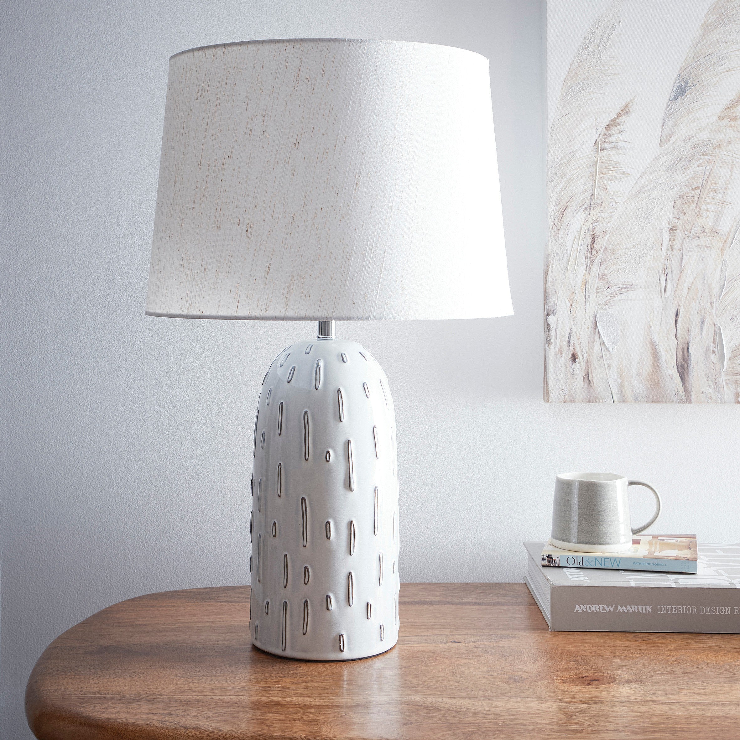 Modern Ceramic Table Lamp in a Soft White Base Finish with a Natural Linen Shade