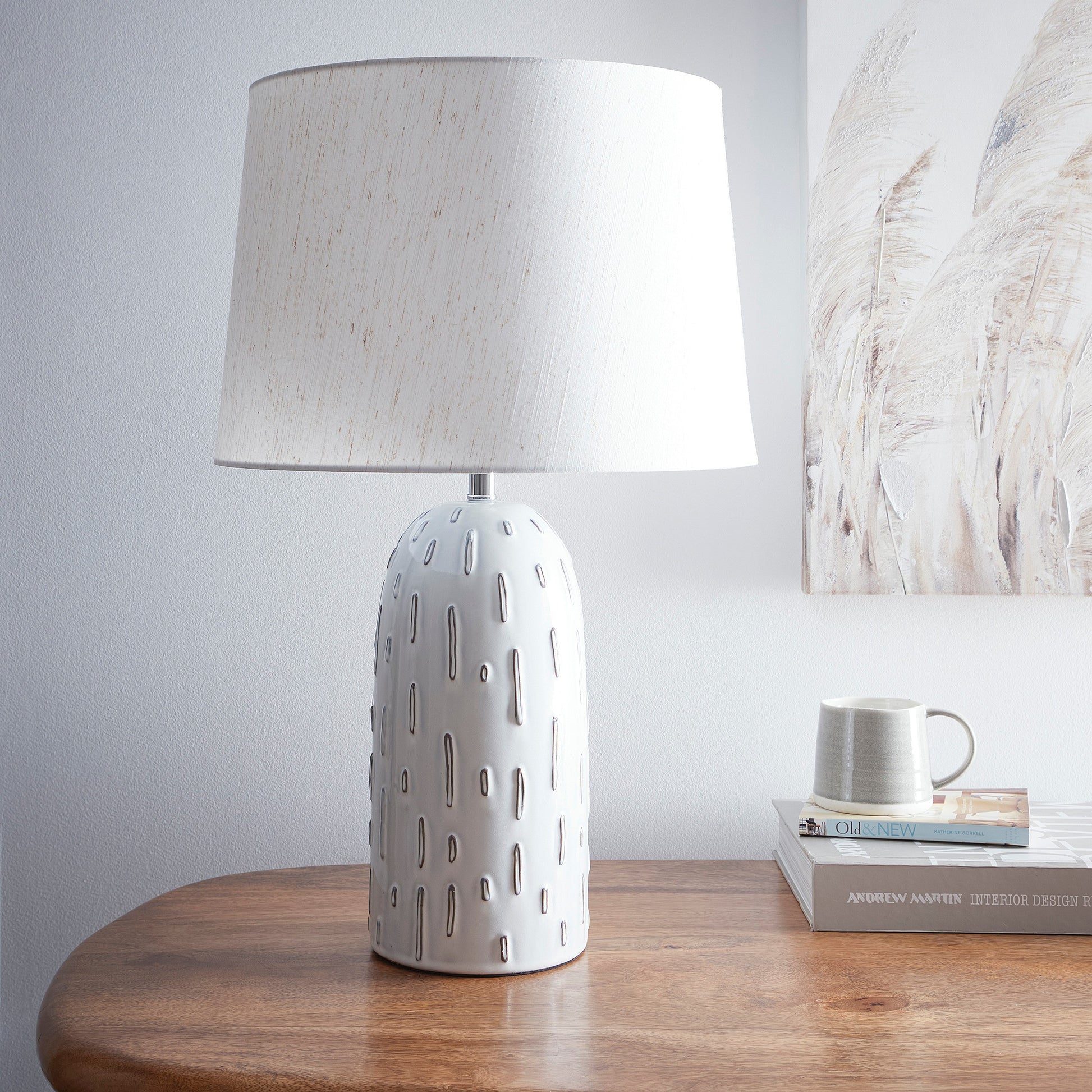 Modern Ceramic Table Lamp in a Soft White Base Finish with a Natural Linen Shade