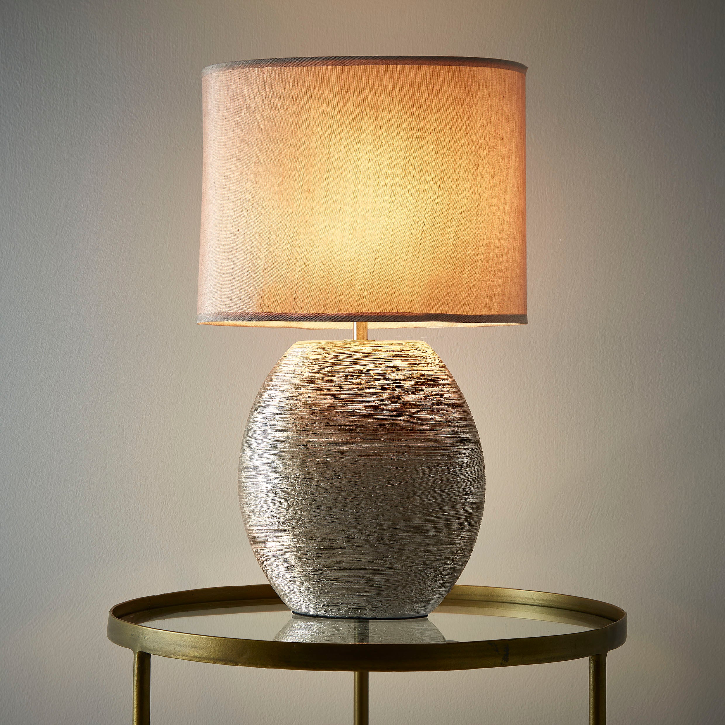 Waltham Champagne Gold Ceramic Table Lamp complete with a Champagne Gold Lamp shade