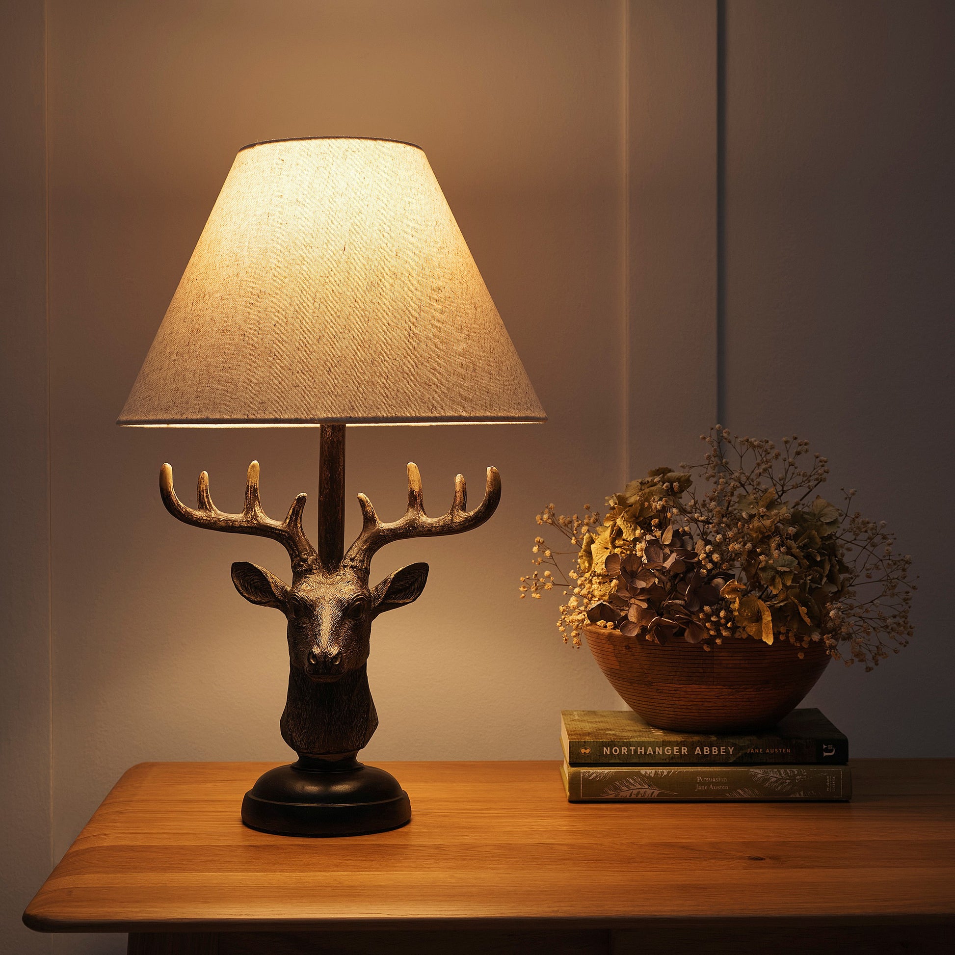 Antlers Stag Head Animal Table Lamp in an Antique Copper Table Lamp with a Natural Linen Lampshade