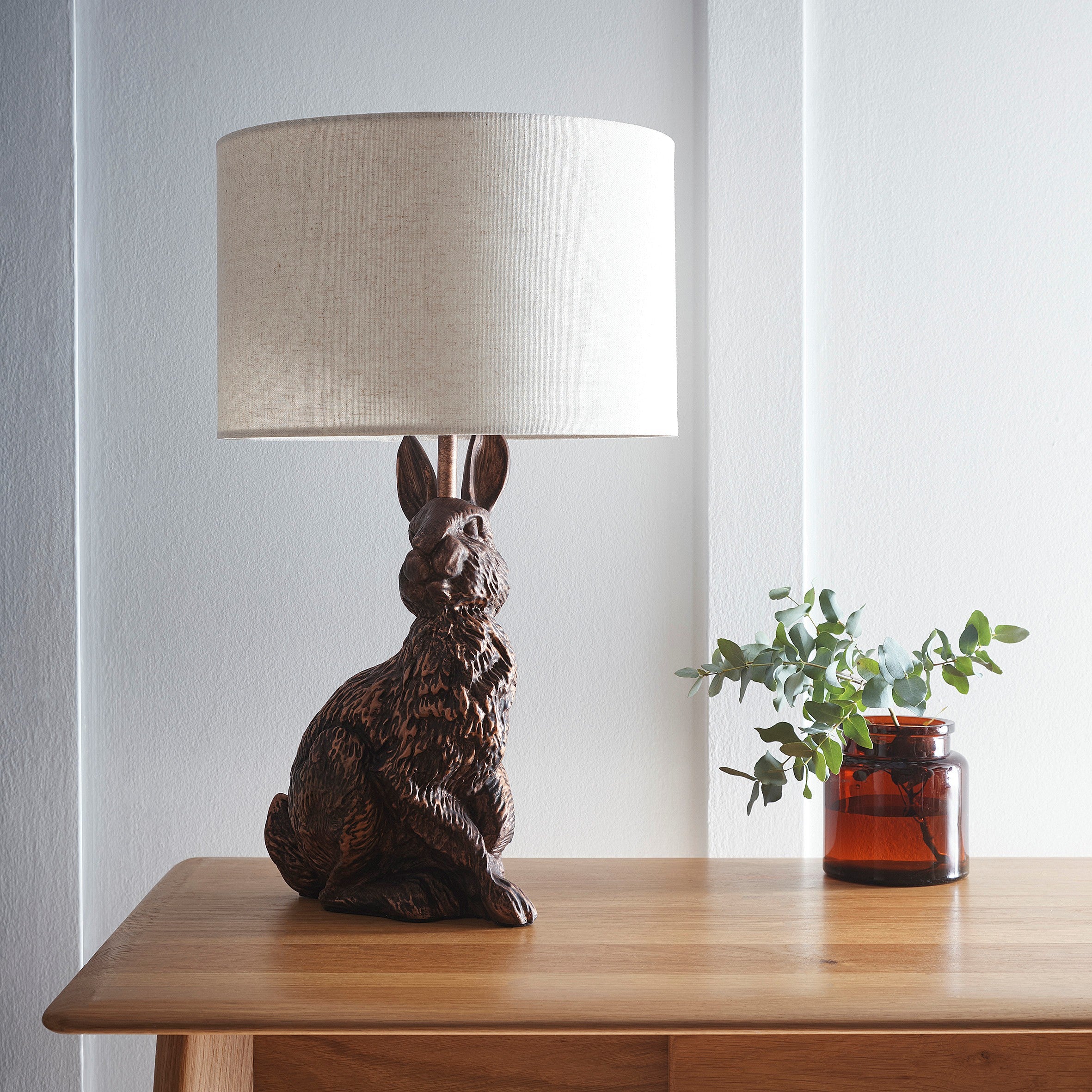 Bunny Rabbit Animal Table Lamp in an Antique Copper Resin Finish with a Natural Linen Lampshade