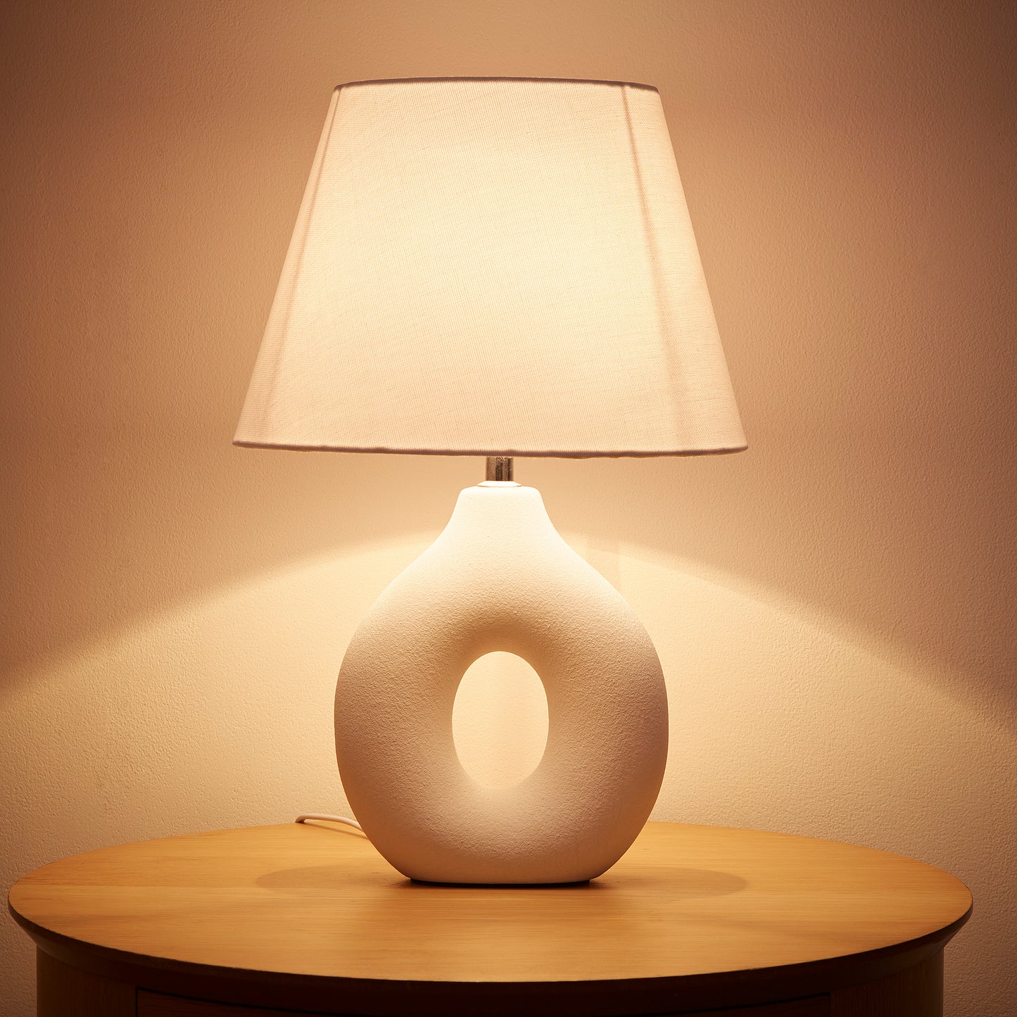White Ceramic Table Lamp with a White Cotton Drum shade and decorative textured finish