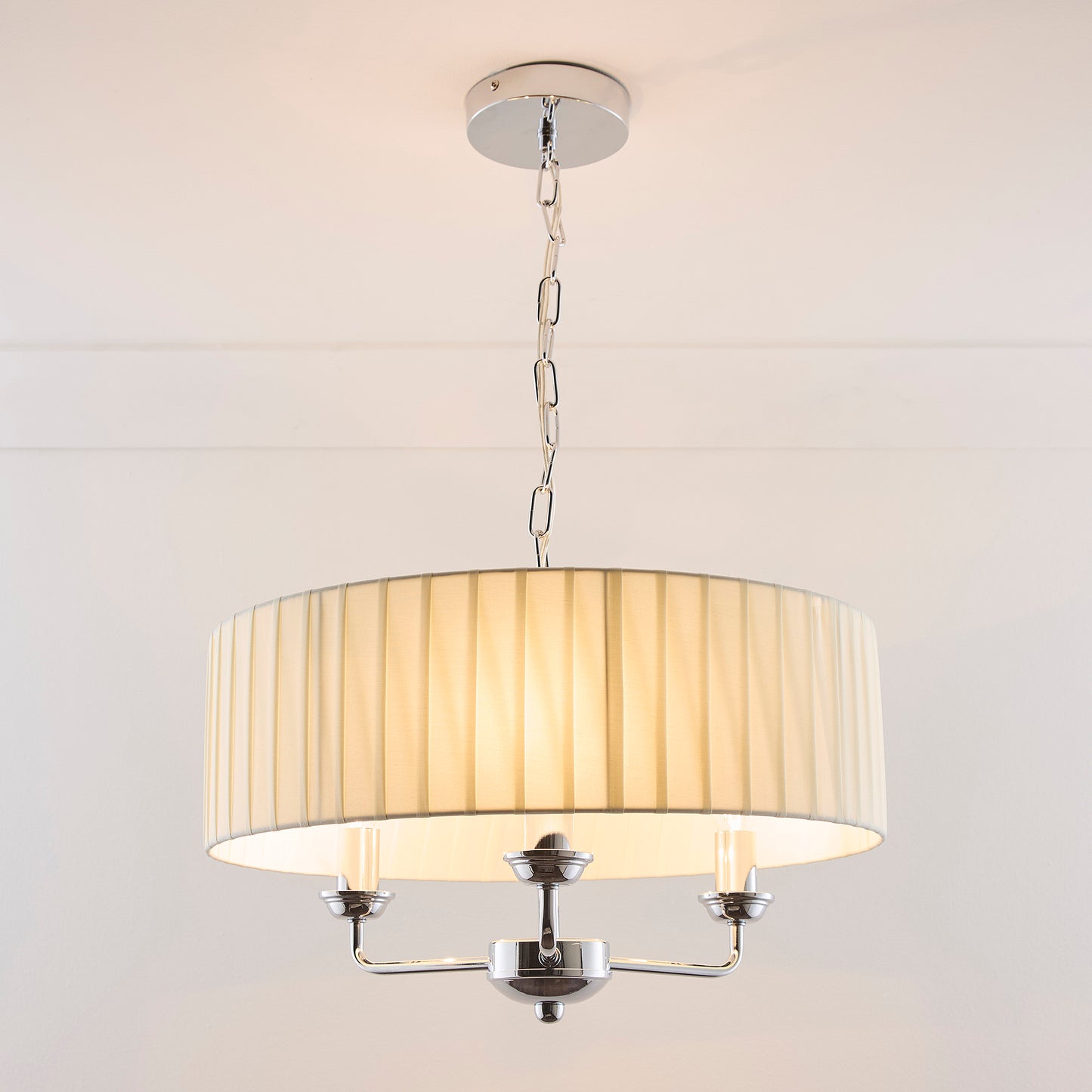 3 Light Pleated shade Chandelier with a 3 arm Polished Chrome Frame available in Cream, Grey and Navy