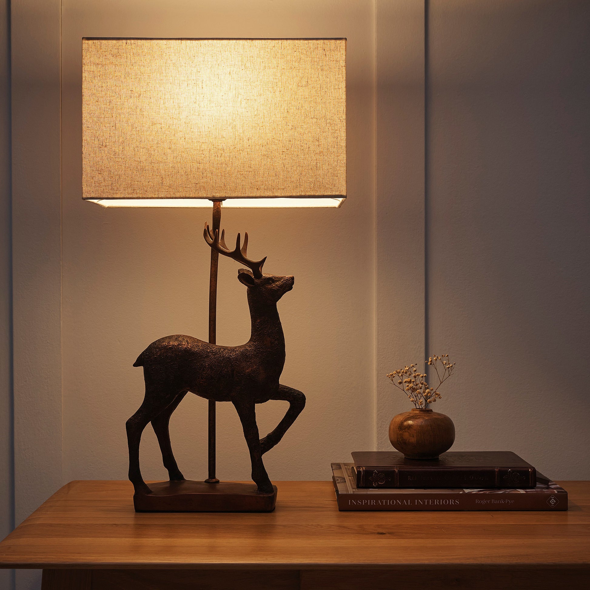 Stag Table Lamp in an Antique Copper Resin Table Lamp with a Natural Linen Lampshade