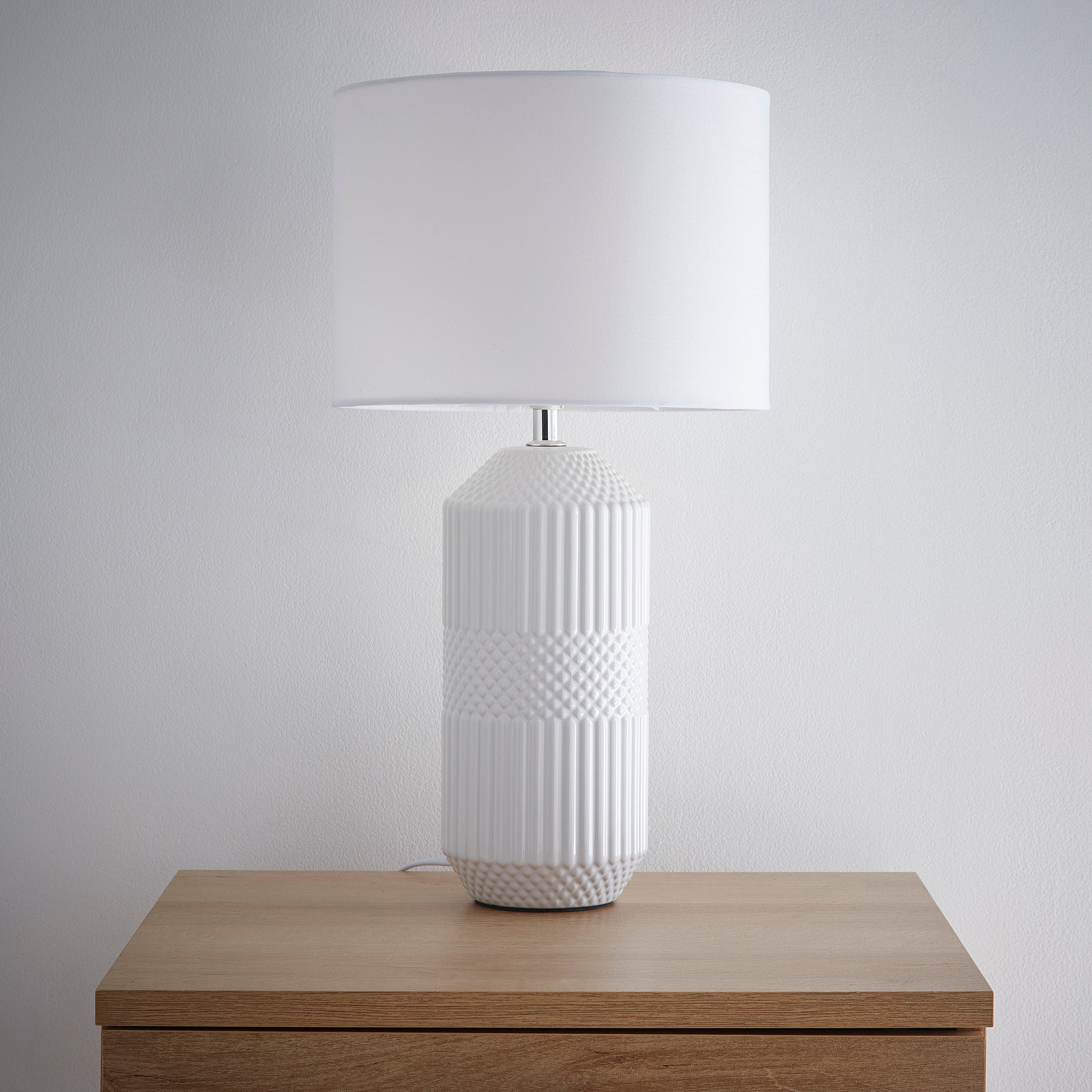 White Ceramic Table Lamp with a Gloss White body and White Cotton Lampshade