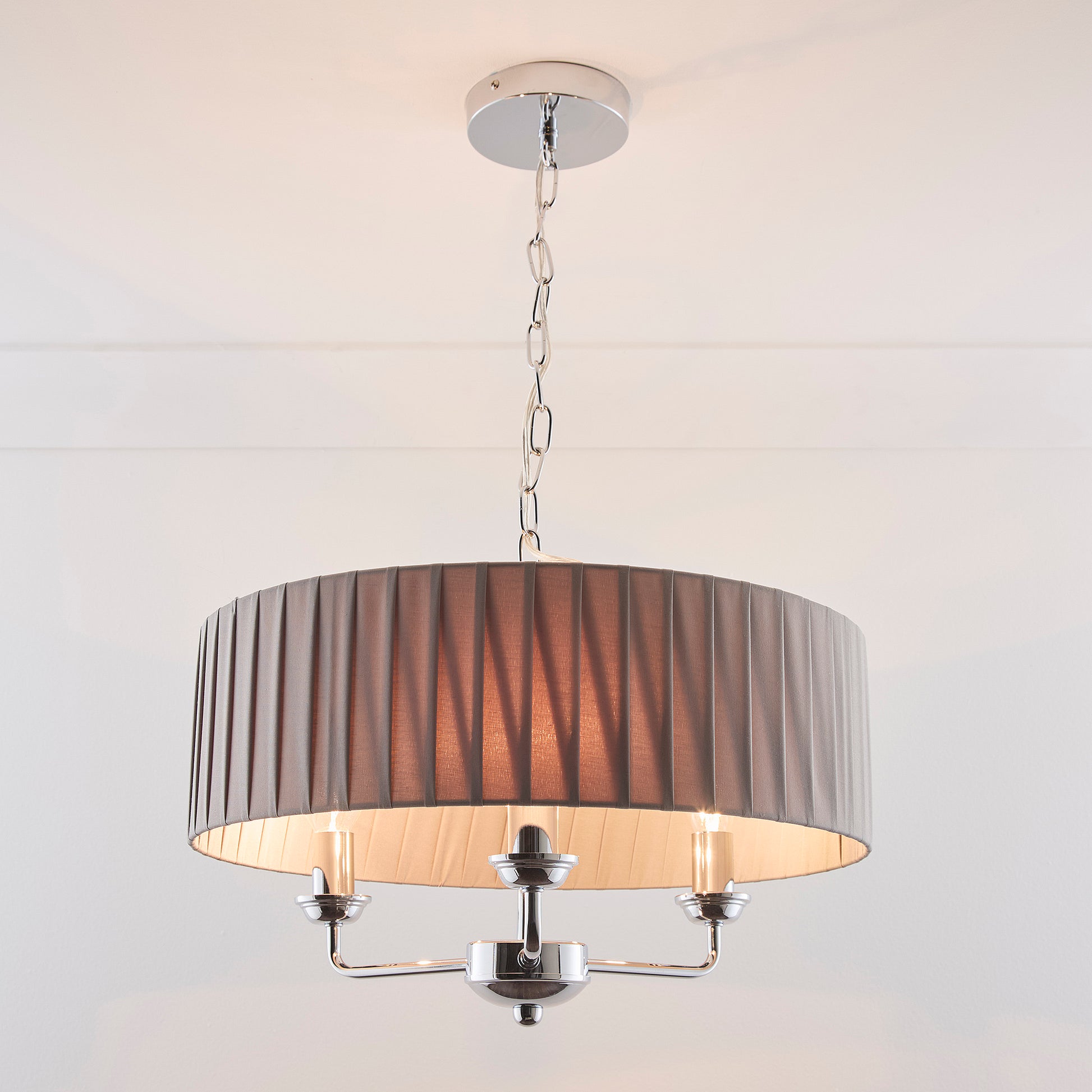 3 Light Pleated shade Chandelier with a 3 arm Polished Chrome Frame available in Cream, Grey and Navy