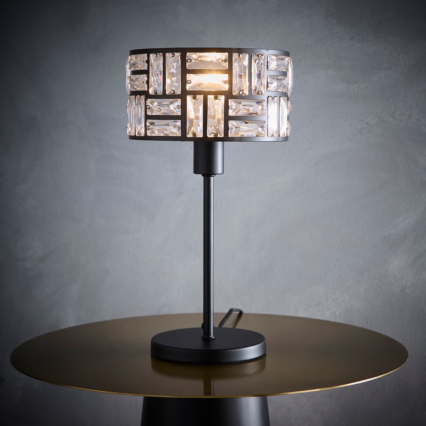 Black Table Lamp With Acrylic Glass Drum Shade in a Metal Cut Out Design