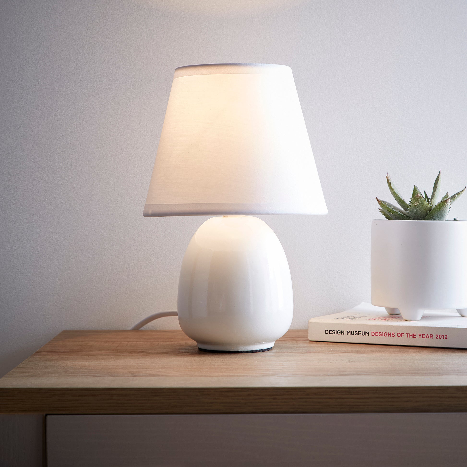 Small Ceramic Bedside or Table lamp with White Lampshade available in 3 Colours