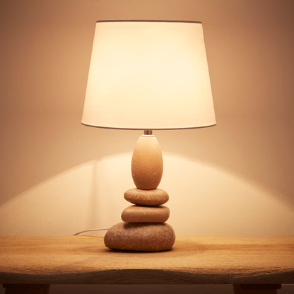 Kai Ceramic Table lamp with a Pebbles shade stand and a White Cotton Lampshade