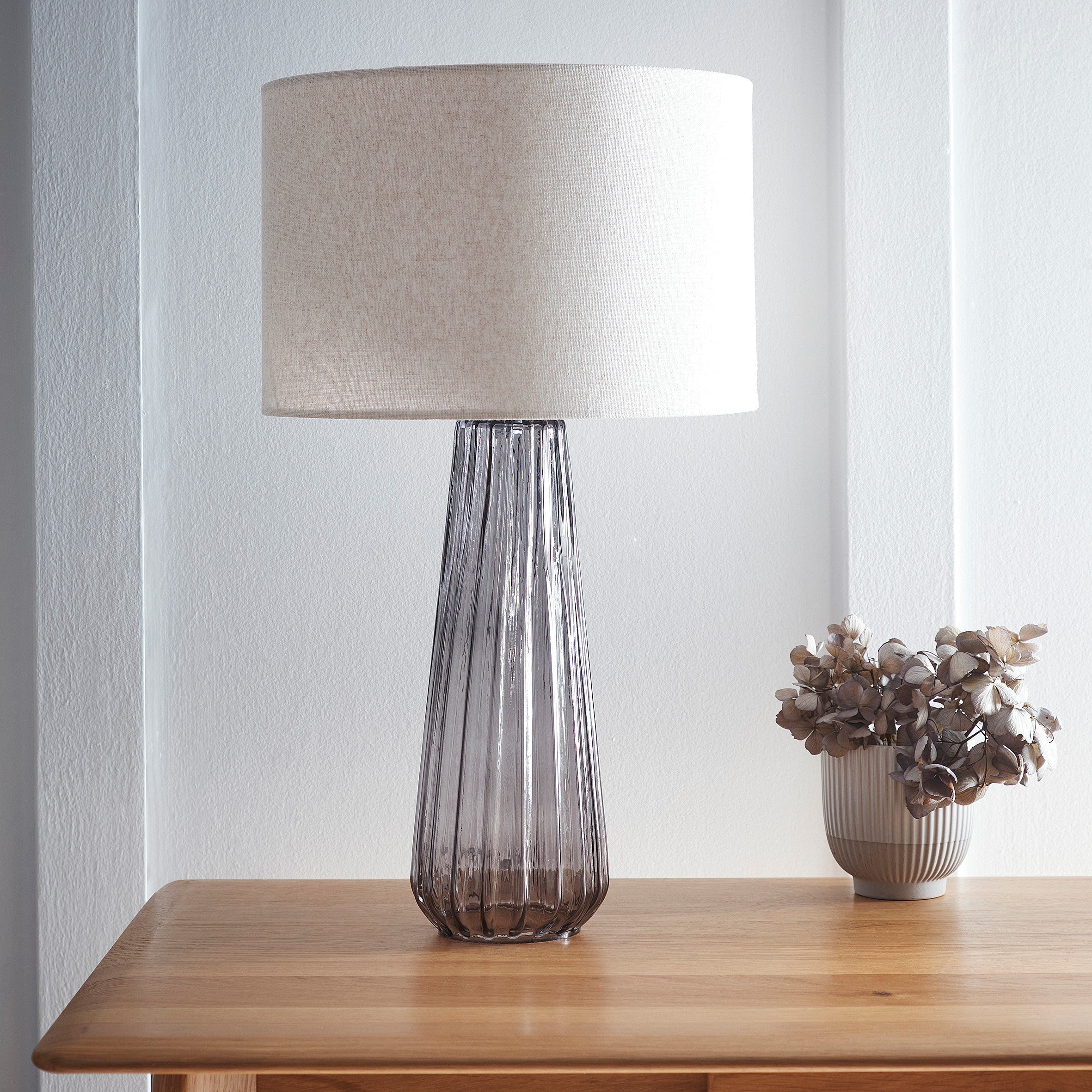 Tall Smoke Grey Glass Design Table Lamp with a Natural Linen Lampshade