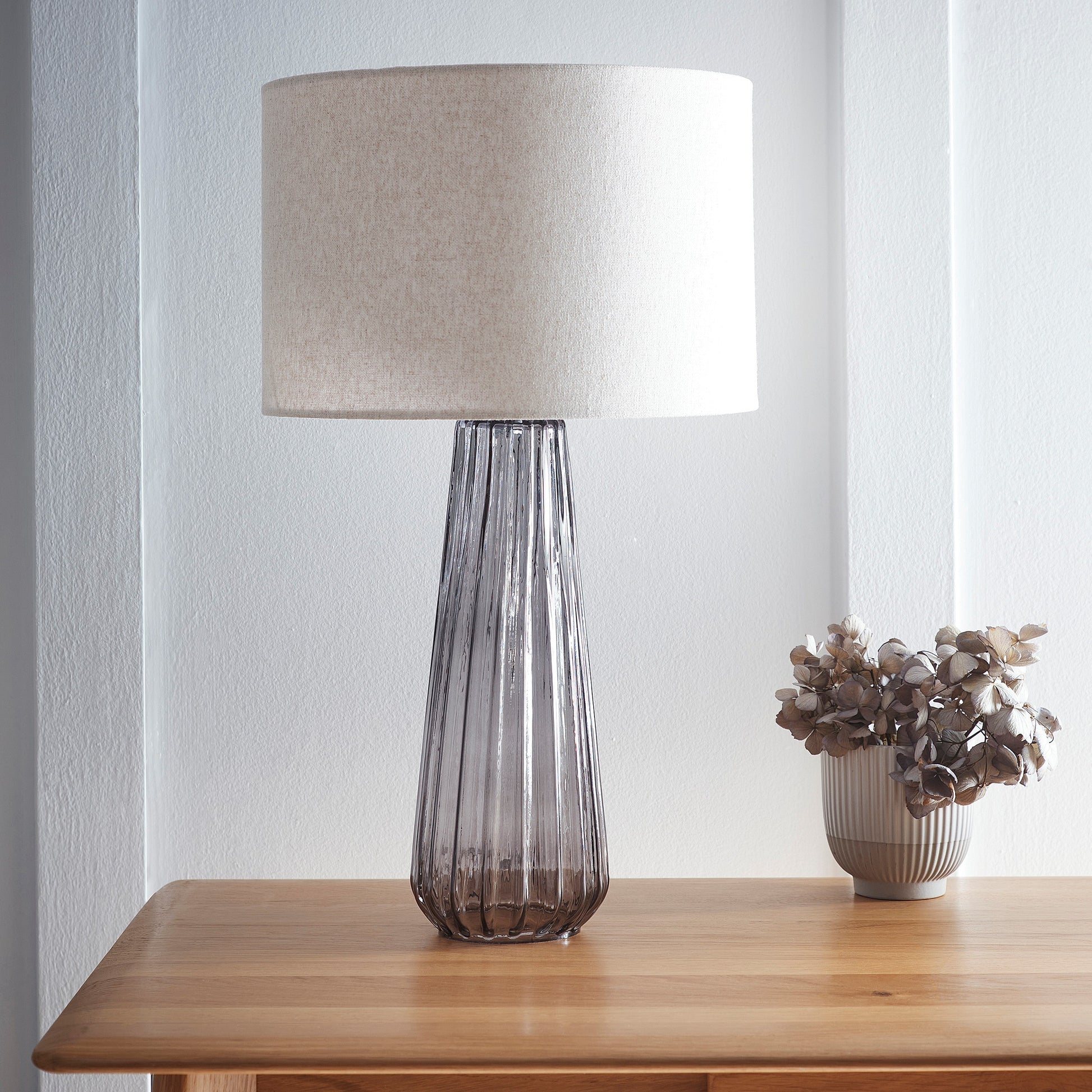 Tall Smoke Grey Glass Design Table Lamp with a Natural Linen Lampshade