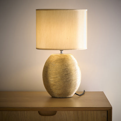 Waltham Gold Ceramic Table Lamp complete with a Champagne Gold Lamp shade