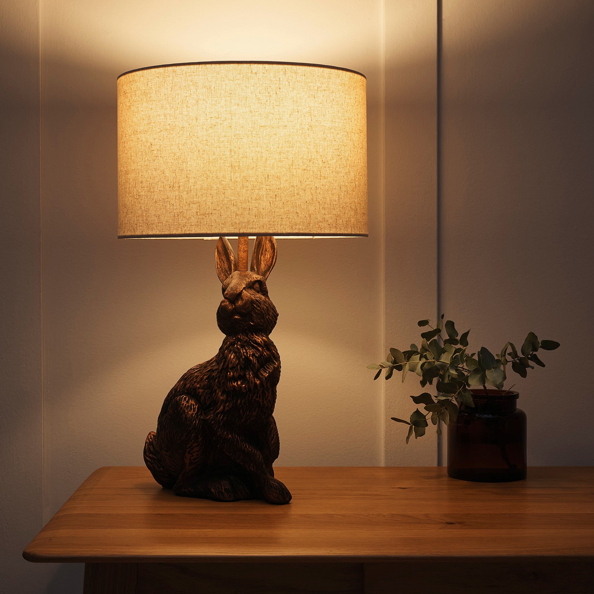 Bunny Rabbit Animal Table Lamp in an Antique Copper Resin Finish with a Natural Linen Lampshade