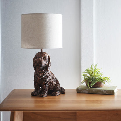 Puppy Animal Table Lamp in an Antique Copper Finish with a Natural Linen Shade