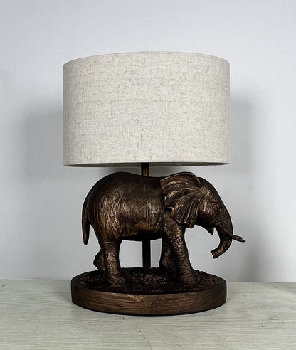 Elephant Lamp in an Antique Copper Resin Table Lamp with an Oval Natural Linen Shade