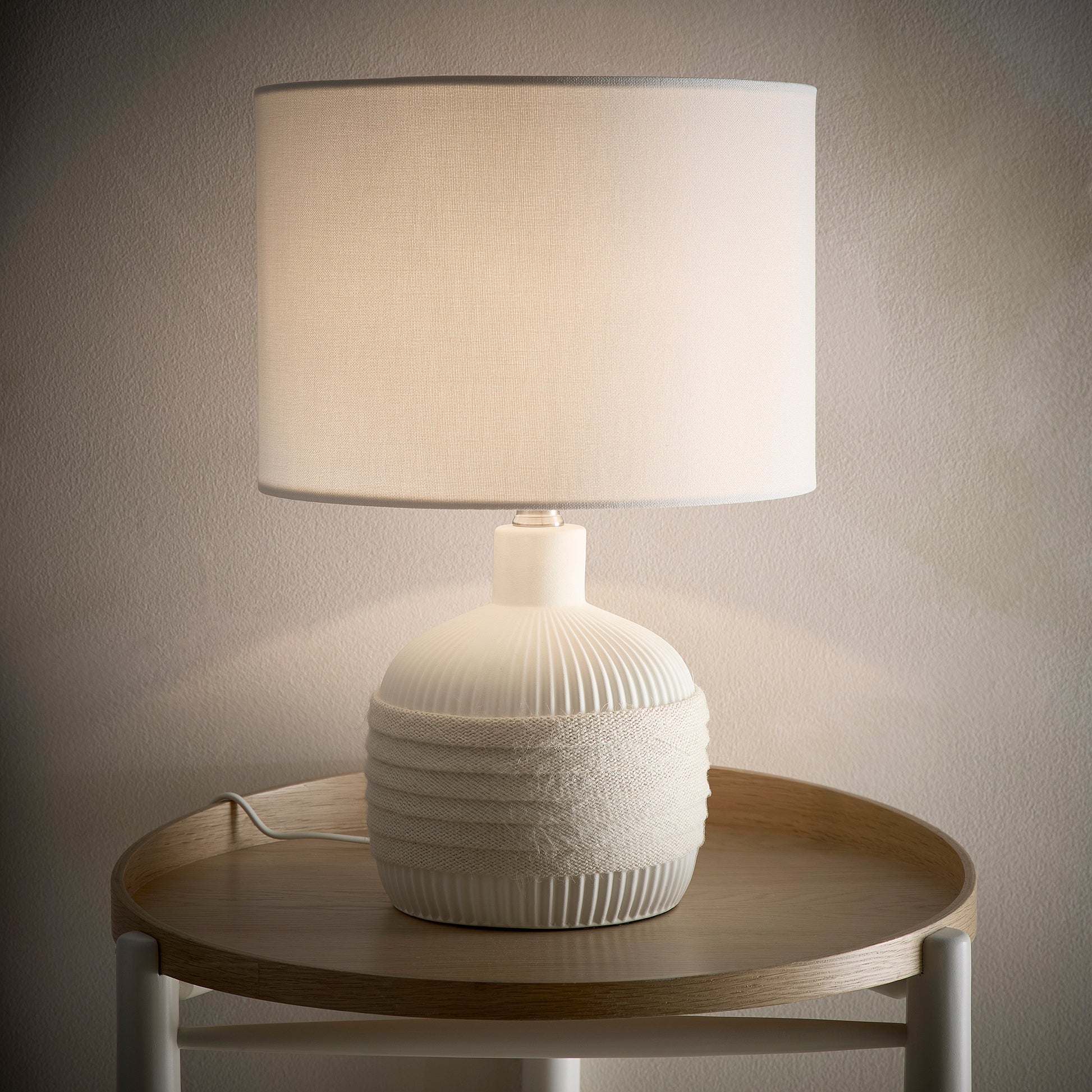 Stunning Ceramic Table lamp with a natural Rope Design Base and a Natural Linen Drum shade
