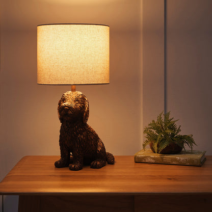 Puppy Animal Table Lamp in an Antique Copper Finish with a Natural Linen Shade