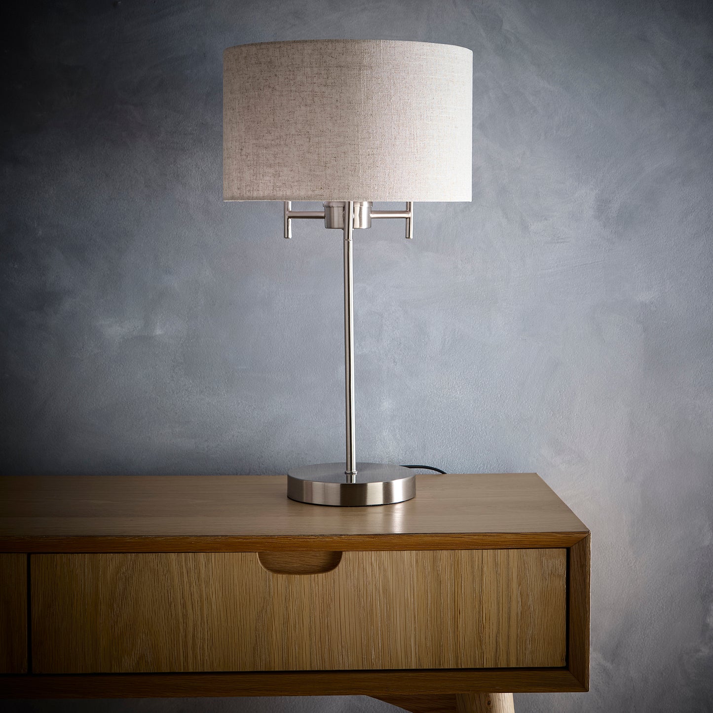 Tall Table Lamp in a Satin Nickel Finish with a Linen Lampshade to compliment the full design