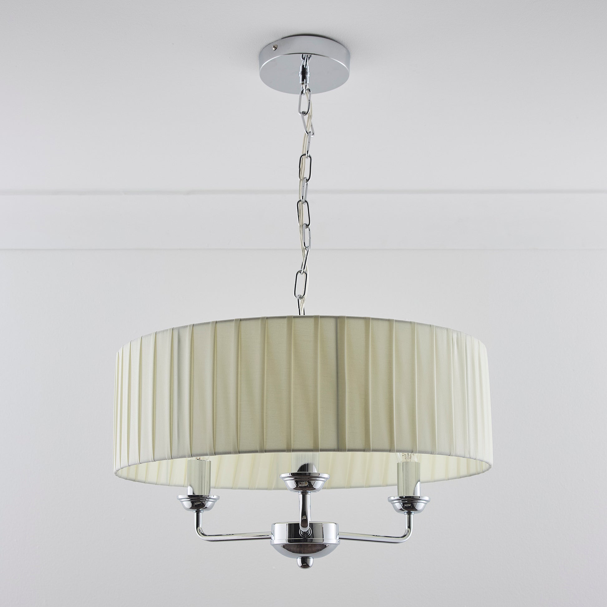 3 Light Pleated shade Chandelier with a 3 arm Polished Chrome Frame available in Cream, Grey and Navy