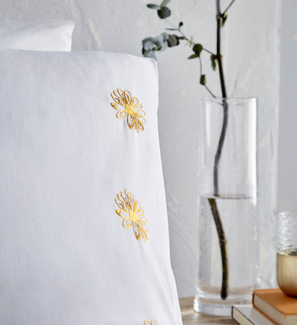 Daisy Flower Bedding with Daisy Motifs in Ochre and Charcoal on White Bedding