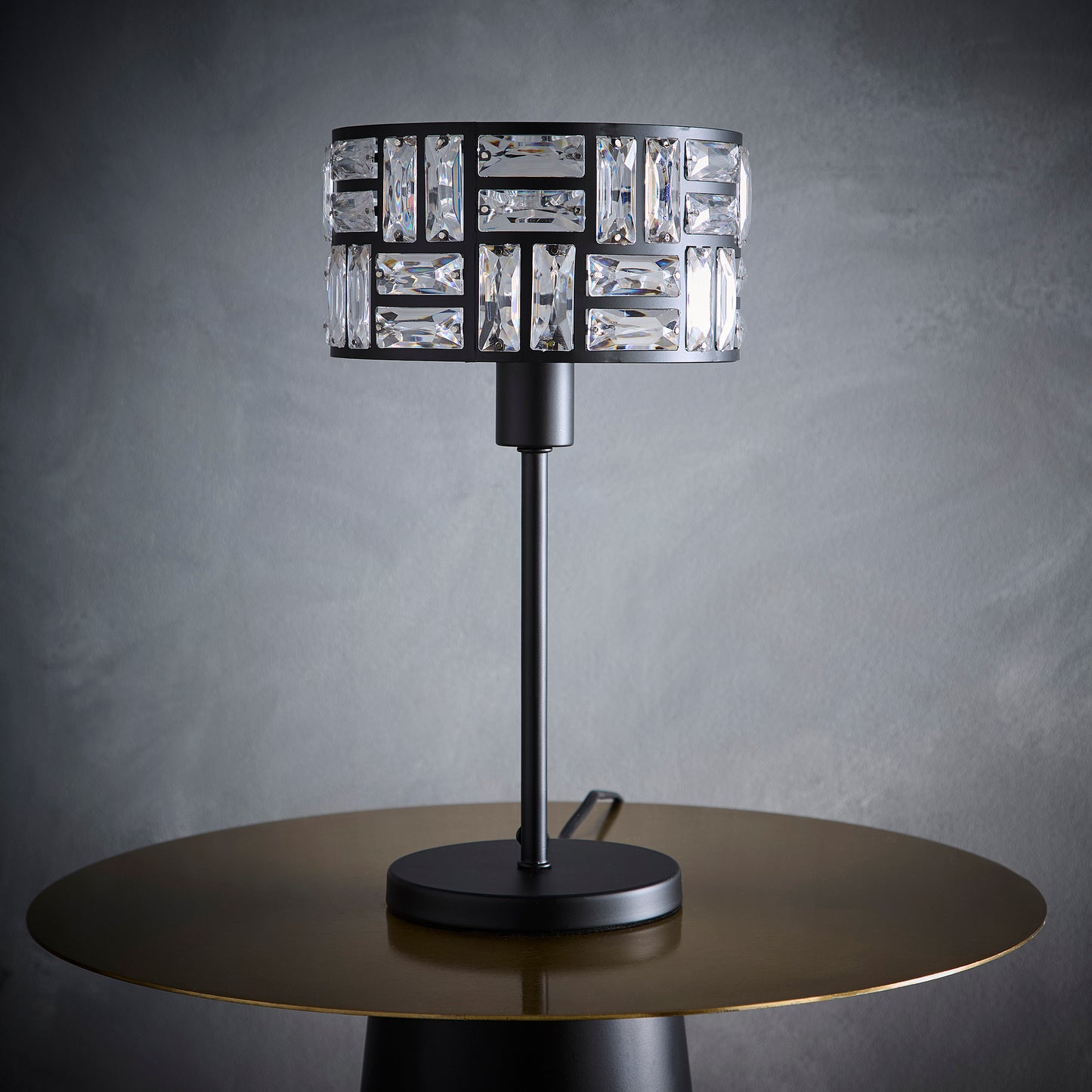 Black Table Lamp With Acrylic Glass Drum Shade in a Metal Cut Out Design