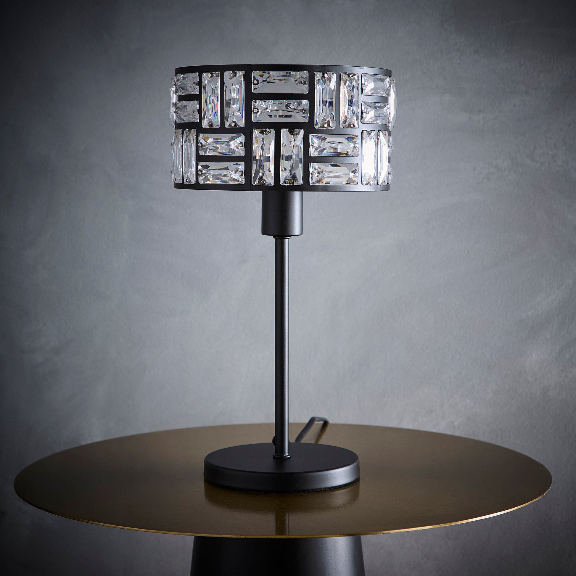 Black Table Lamp With Acrylic Glass Drum Shade in a Metal Cut Out Design